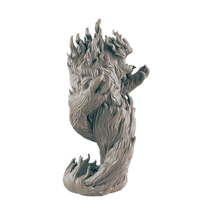 A sculpted figure, resembling flowing flames or hair, stands alone against a black background.