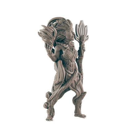 A miniature figurine of a wood elf stands, holding a staff and a leafy element; against a dark background.