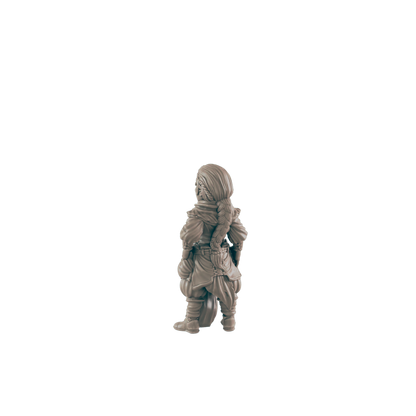 A miniature female figure, stands facing away, against a dark background.