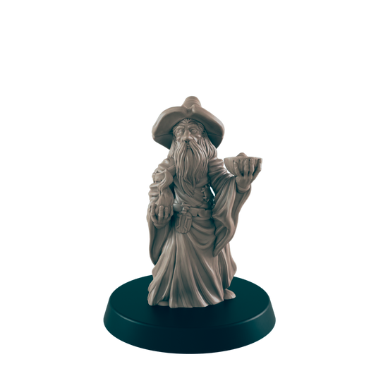 A wizard figurine stands, holding an object, on a dark circular base.