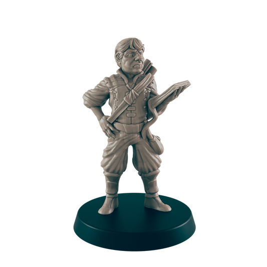 A miniature figurine of a stout, short-haired man, dressed in breeches and a tunic, stands on a dark circular base. He holds a lute-like instrument, appearing pensive.