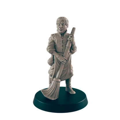 A miniature figurine of a man holds a broom. He is dressed in medieval-style clothing. The figurine stands on a dark circular base.