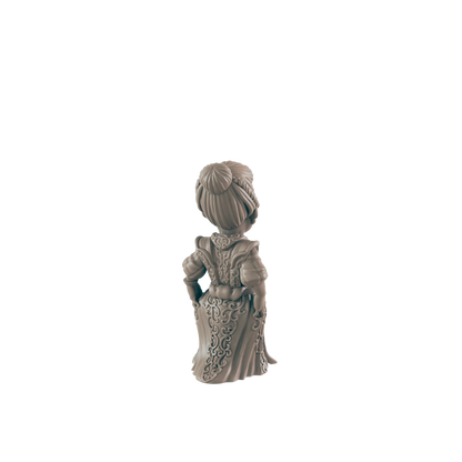 A miniature figurine of a woman, stands facing away, wearing an ornate gown; it is displayed against a black background.