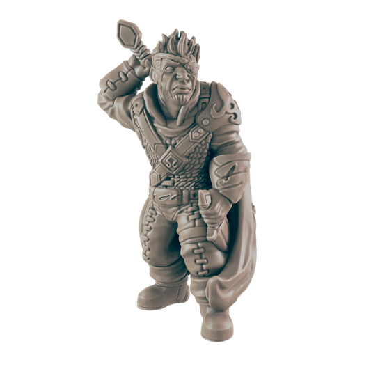 A monochromatic, humanoid miniature figure stands with one hand raised, holding a spear. The figure wears fantasy-style garb, including armor and a cape.