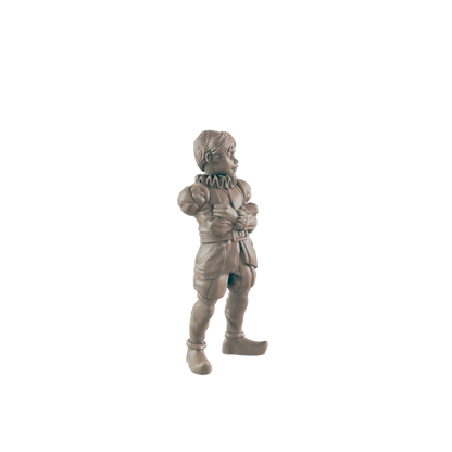 A miniature figurine of a boy, standing with arms crossed, is shown against a black background.