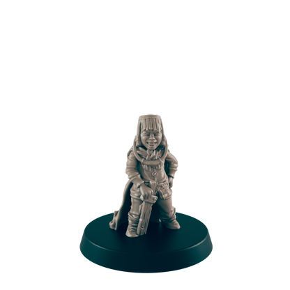 A miniature figurine of a young person, grinning and holding a sword, stands on a circular base against a black background.