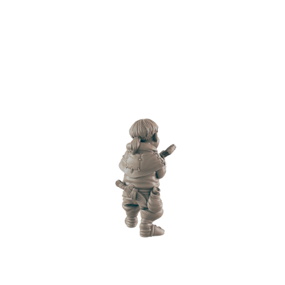 A small, grey figurine of a person, possibly a child, stands holding a weapon, set against a black background.