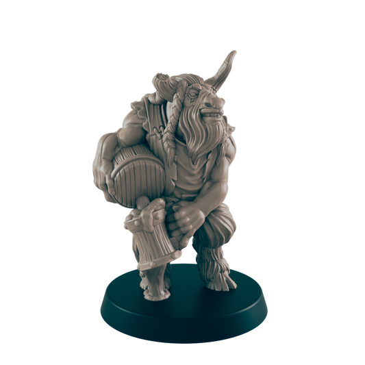 A Minotaur miniature holds a barrel and mallet; it is crouched on a circular base.