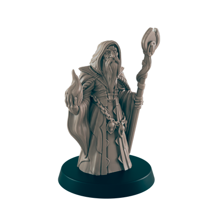 A miniature wizard figurine stands on a circular base; he holds a flame in one hand and a staff in the other.  The figurine is sculpted in a hooded robe, against a dark background.