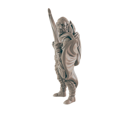 An elf-like statue stands on a black background, holding a large sword over his left shoulder and wearing tunic, leggings and boots.