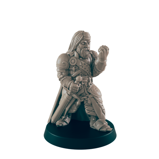 A miniature warrior holds a fist up, as though casting a spell. The figurine is made of beige material and stands on a black base.