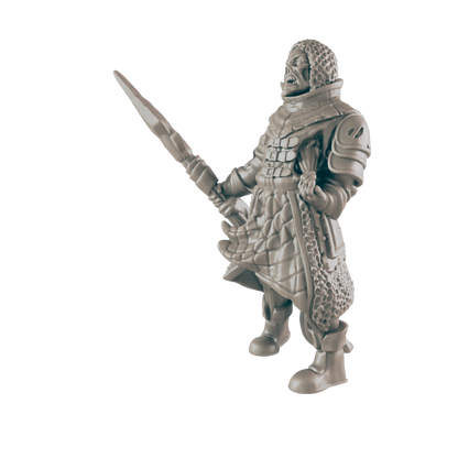 A miniature figure of a warrior, holding a spear, stands against a dark background.