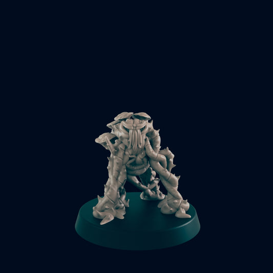 A spindly, four-legged monster stands on a dark-blue-green base, facing forward. The dark-blue-green background makes it appear to float.